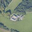 Oblique aerial view of Altyre House Stables, looking NW.