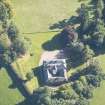 Oblique aerial view of Holme Rose House, looking ENE.