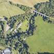 Oblique aerial view of Divie Railway Viaduct and Edinkillie House, looking ENE.