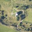 Oblique aerial view of Muckrach Castle, looking NNW.