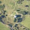 Oblique aerial view of Muckrach Castle, looking NW.