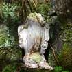 Remains of a plaster angel figure on a ledge above rock shelter, Inchnacardoch Forest Block, South Loch Ness