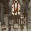 Stained glass window in chancel showing St. Columba, St. Margaret and St. Ninian