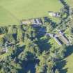 Oblique aerial view of House of Aquahorthies, walled garden, farmstead and Nether Mains of Aquahorthies, looking WSW.