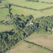 Oblique aerial view of Lickleyhead Castle, looking W.