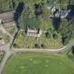 Oblique aerial view of Kirkton of Culsalmond Old Parish Church, looking NW.