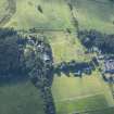 Oblique aerial view of Rothiemay House, Mains of Mayen, Mains of Rothiemay and Rothiemay Castle, looking SSE.