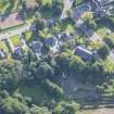 Oblique aerial view of St Rufus Church and Holy Trinity Episcopal Church, looking SE.