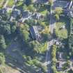 Oblique aerial view of St Rufus Church, looking E.