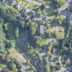 Oblique aerial view of St Rufus Church, looking ENE.