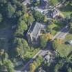 Oblique aerial view of St Rufus Church, looking NE.