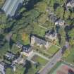 Oblique aerial view of St Rufus Church, looking WNW.