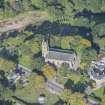 Oblique aerial view of St Rufus Church, looking W.