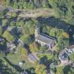 Oblique aerial view of St Rufus Church, looking W.