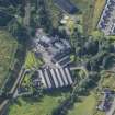 Oblique aerial view of Strathmill Distillery, looking SSW.