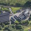 Oblique aerial view of Strathmill Distillery, looking ESE.