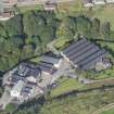 Oblique aerial view of Strathmill Distillery, looking WNW.