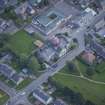 Oblique aerial view of St Thomas' Roman Catholic Church and Presbytery, looking NE.