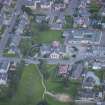 Oblique aerial view of St Thomas' Roman Catholic Church and Presbytery, looking NNE.