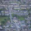 Oblique aerial view of St Thomas' Roman Catholic Church and Presbytery, looking WNW.