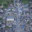 Oblique aerial view of St Thomas' Roman Catholic Church, Presbytery and Reidhaven Square, looking W.