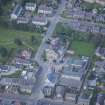 Oblique aerial view of St Thomas' Roman Catholic Church and Presbytery, looking WSW.