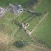Oblique aerial view of Findochty Castle, looking NE.