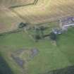 Oblique aerial view of Findochty Castle, looking SSW.