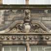 Detail of carving above window on West elevation.