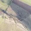 Oblique aerial view of Acerknowe trenches near Stobs Camp, looking E.