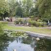 General view of Gun Emplacement looking north with garden pond in foreground.