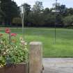 General view of War department No. 3 boundary post now used as ornamental stone in garden.