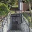 General view of entrance to oil store from the West looking down the steps.