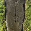 View of recumbent incised cross slab