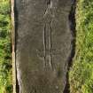 View of recumbent incised cross slab (including scale)