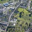 Oblique aerial view of Wellshill Cemetery with the Royal Infirmary Perth beyond, looking WSW.