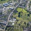 Oblique aerial view of Wellshill Cemetery with the Royal Infirmary Perth beyond, looking WSW.