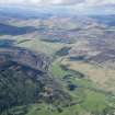 General oblique aerial view of Gleann Fearnach with Glenfernate Lodge and Loch Crannach beyond, looking NNE.