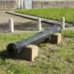 Cannon on grass in Fort, photograph from desk-based assessment and historic building survey of Fort House, Leith, Edinburgh