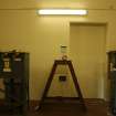 East guardhouse, Room 1, west wall and 11kv freestanding ring switches,  photograph from desk-based assessment and historic building survey of Fort House, Leith, Edinburgh