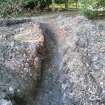 Post-excavation view of BT track, photograph from watching brief at Hopetoun Estate for proposed cycle path, West Lothian