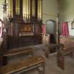 Organ loft and choir benches.