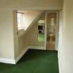 West end of first floor bedroom in east wing, showing original window and doors to bathroom and corridor, photograph from a historic building appraisal at Muirfield Gate, Duncur Road, Gullane