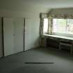 South east corner of first floor south bedroom, showing 'built-in' storage and windows, photograph from a historic building appraisal at Muirfield Gate, Duncur Road, Gullane