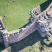Oblique aerial view of the Mid Tower at Tantallon Castle, looking E.