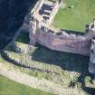 Oblique aerial view of the Douglas Tower and Mid Tower at Tantallon Castle, looking NE.