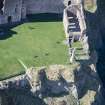 Oblique aerial view of the west wing of Tantallon Castle, looking WSW.