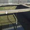 Water filtration plant. View of tank no. 4 from south.Central pipe forces air into the gravel