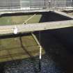 Water filtration plant. View of tank no. 4 from south. The central pipe forces air into the gravel