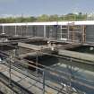 Water filtration plant. Filtration tanks, main building and access walkway from south east